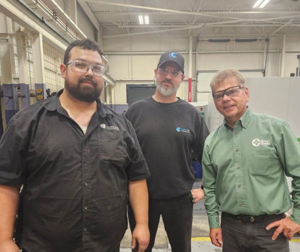 A Career Ready participant at Cavalier's Plant 2 posing for a photo with his arms by his side.