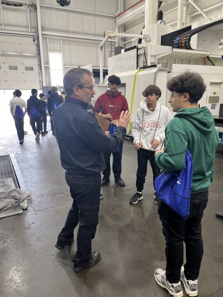 Students in the Cavalier Tool Gundrilling Department on Manufacturing Day during Manufacturing Month.